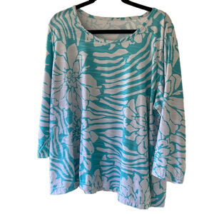Women’s bracket length sleeve blue and white crew neck top.        W1